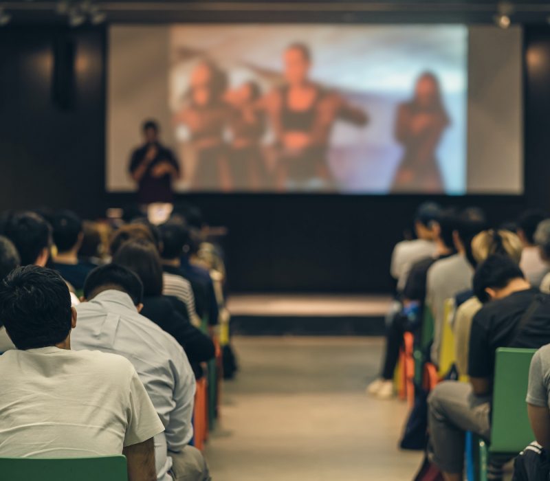 rear-view-of-asian-audience-joining-and-listening-speaker-talking-on-the-stage-in-the-seminar.jpg